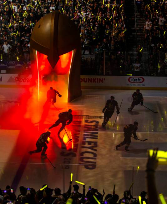 Golden Knights players take the ice during introductions before the first period of Game 3 of a ...