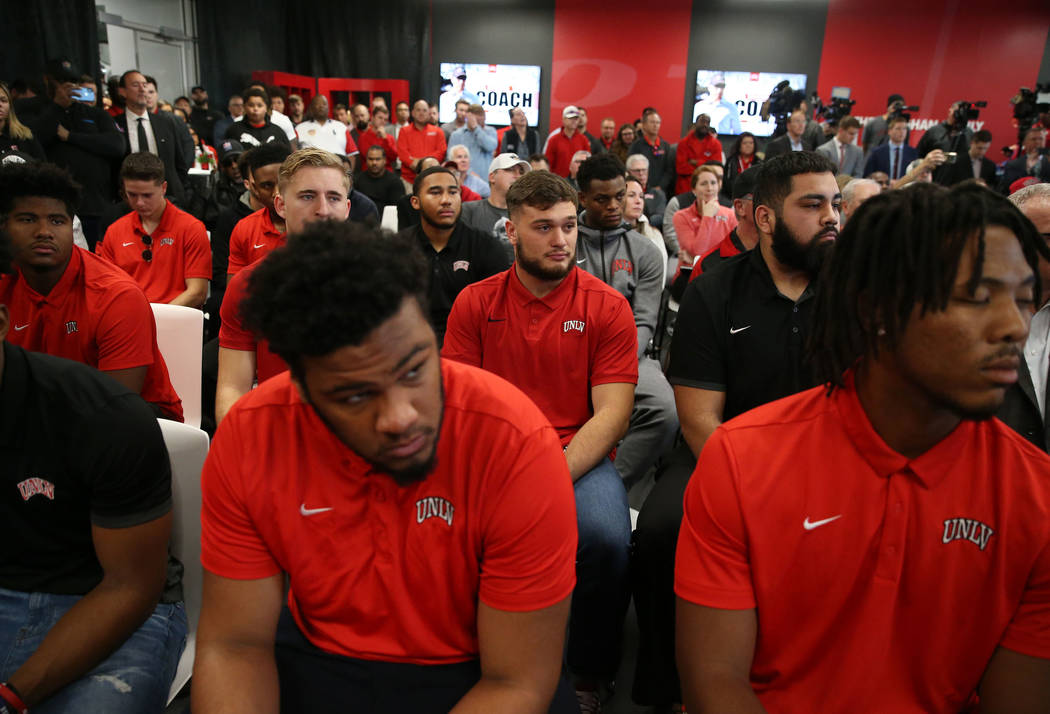 Student athletes attend a press conference to announce UNLV's new football head coach Marcus Ar ...