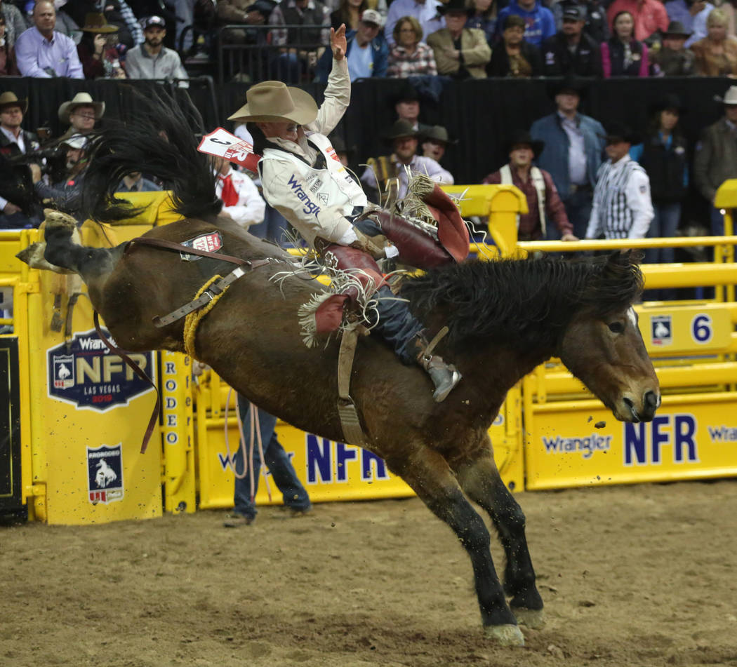 Clayton Biglow of Clements, Calif. rides Showstomper during Bareback Riding in the eighth go-ro ...