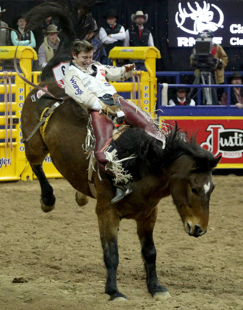 Clayton Biglow of Clements, Calif. rides Showstomper during Bareback Riding in the eighth go-ro ...