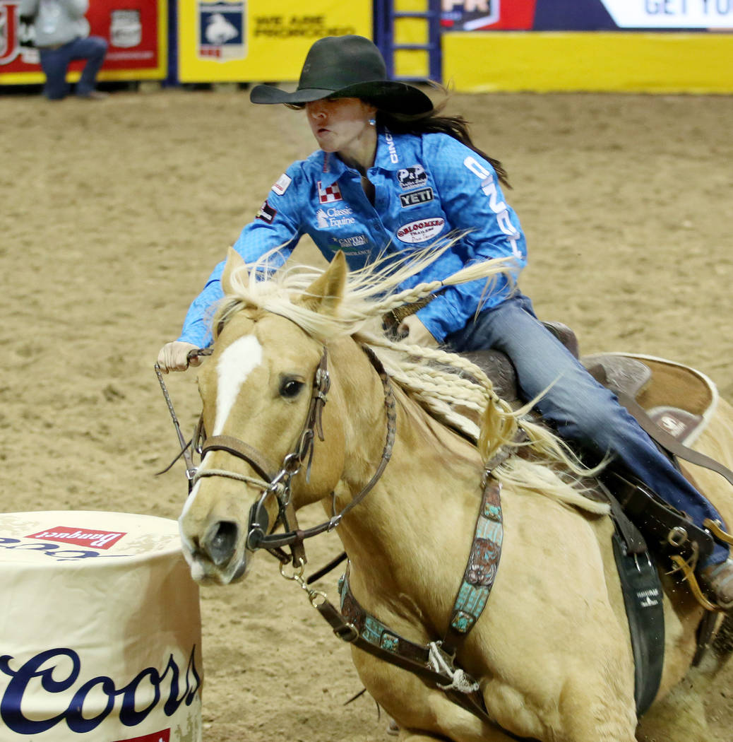Hailey Kinsel of Cotulla, Texas competes in Barrel Racing in the eighth go-round of the Wrangle ...