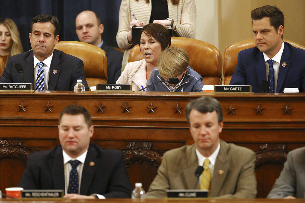 House Judiciary Committee member Rep. Martha Roby, R-Alabama, with her son George in her lap, v ...