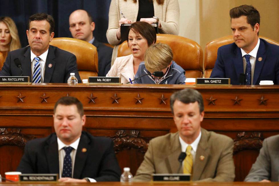 House Judiciary Committee member Rep. Martha Roby, R-Alabama, with her son George in her lap, v ...