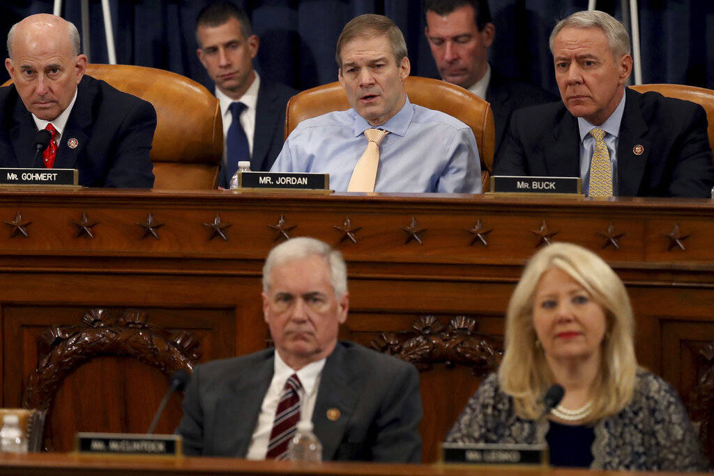 House Judiciary Committee member Rep. Jim Jordan, R-Ohio, center, votes against the second of t ...