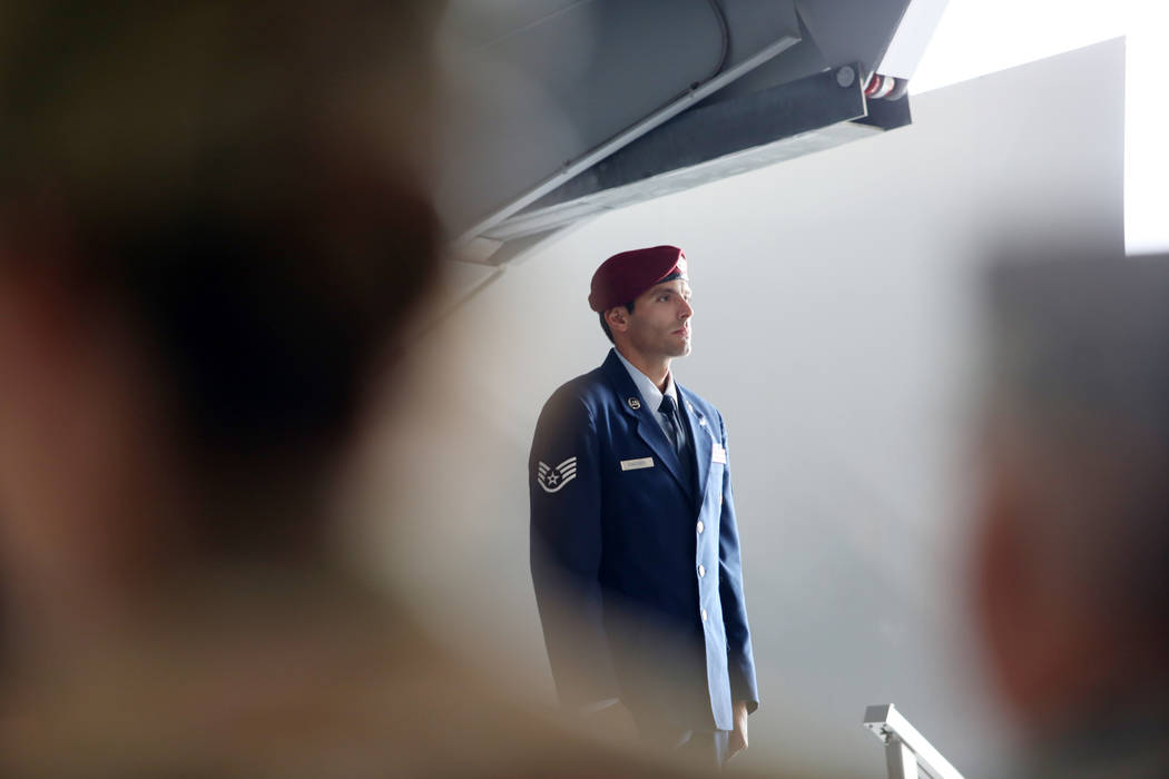 Staff Sgt. Daniel Swensen stands during a ceremony awarding the Silver Star Medal to Technical ...