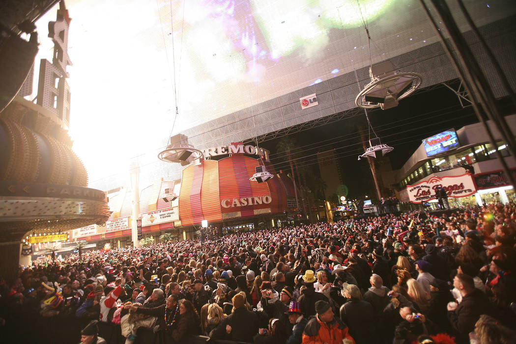 Midnight becomes noon thanks to a virtual fireworks display at midnight Dec. 31, 2010 at the Fr ...