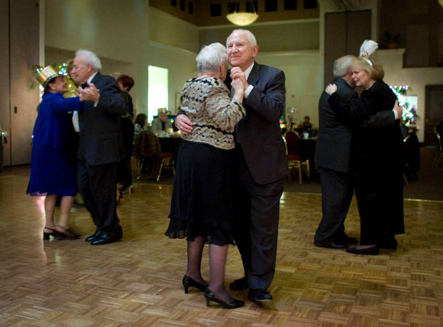 Joe Daszek dances with Midge Howell at a New Year's Eve party in Sun City Summerlin on Dec. 31, ...