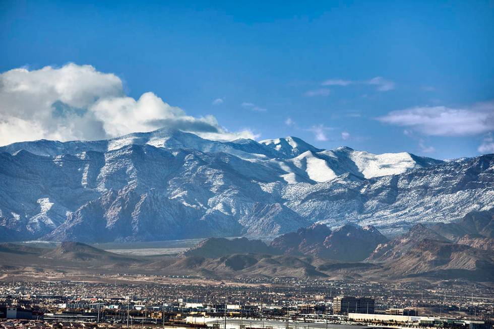 A recent view from the condo shows snow on the mountain. (One Las Vegas)