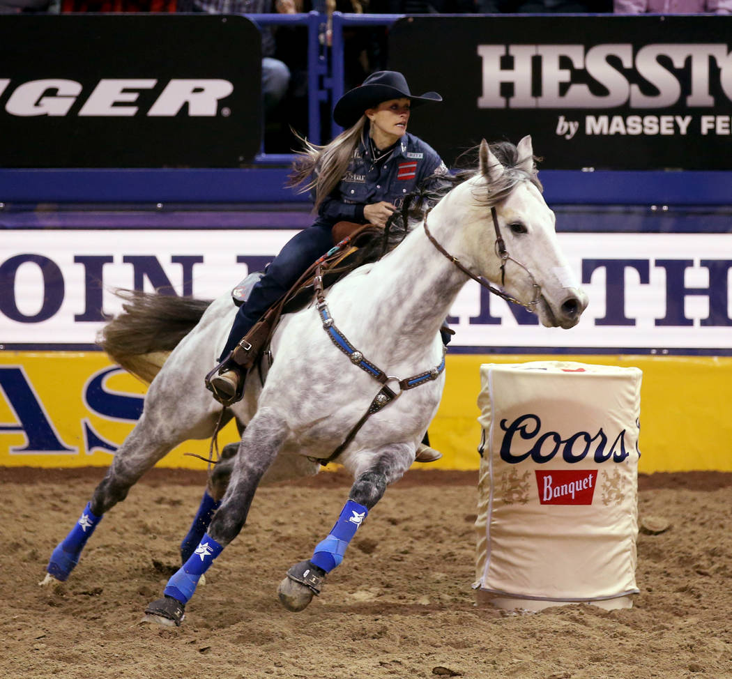 Stevi Hillman of Weatherford, Texas competes in Barrel Racing during the ninth go-around of the ...