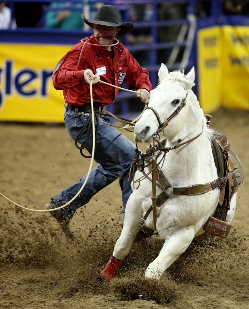 Rile y Pruitt of Gering, Neb. competes in Tie-Down Roping during the ninth go-around of the Wra ...