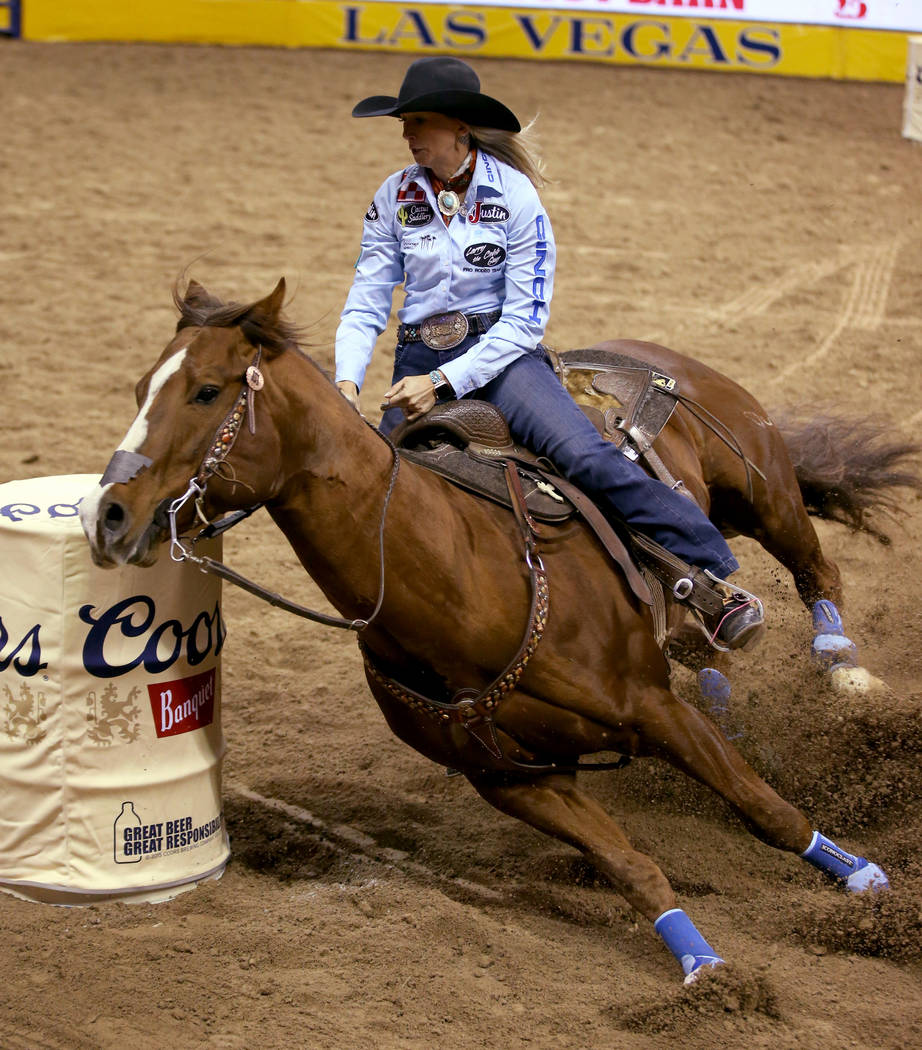 Shali ord of Lamar, Colo. competes in Barrel Racing during the ninth go-around of the Wrangler ...