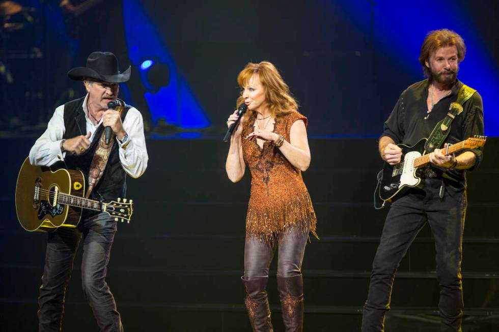 Reba McEntire and Brooks & Dunn perform together at The Colosseum at Caesars Palace in Las Vega ...