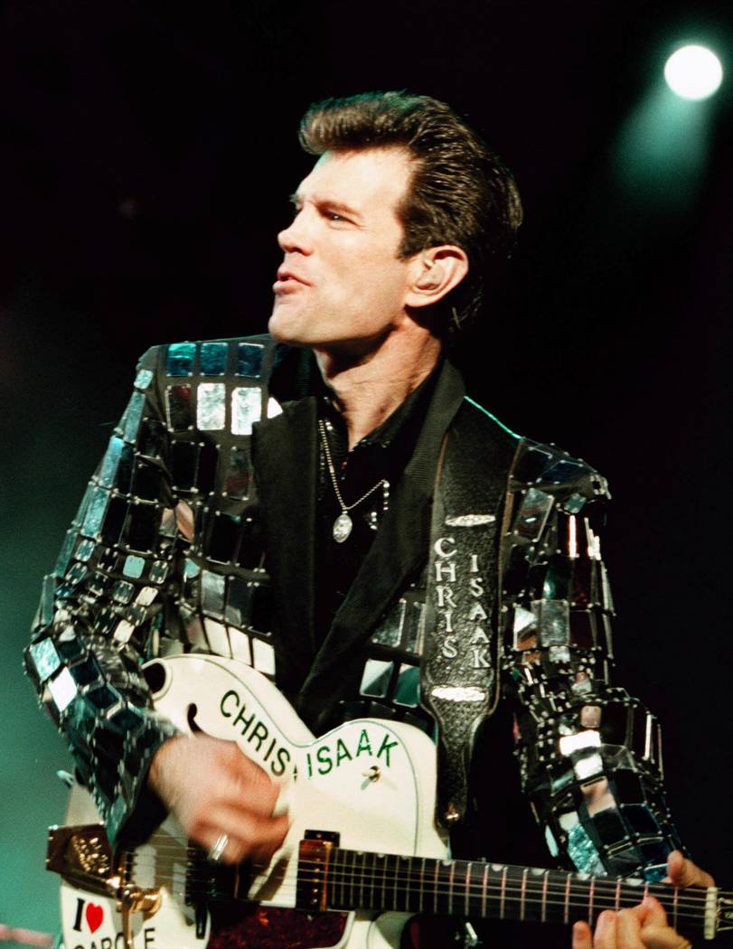 Chris Isaak wears his famous mirrored suit during a performance at the BAMMIES, the California ...