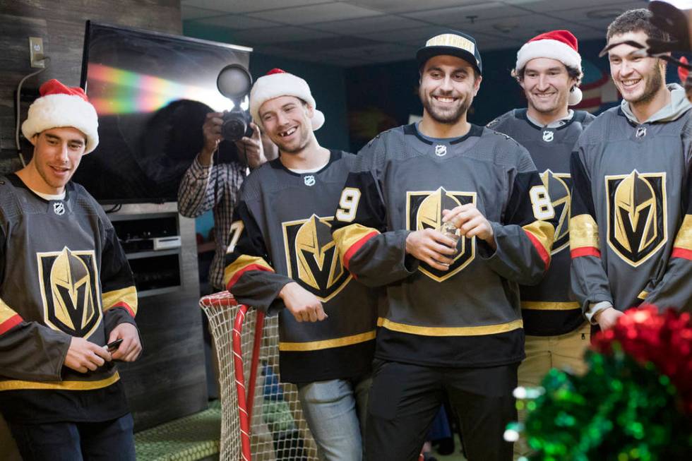 Golden Knights players, from left, Reilly Smith, Shea Theodore, Alex Tuch, Mark Stone, and Bray ...