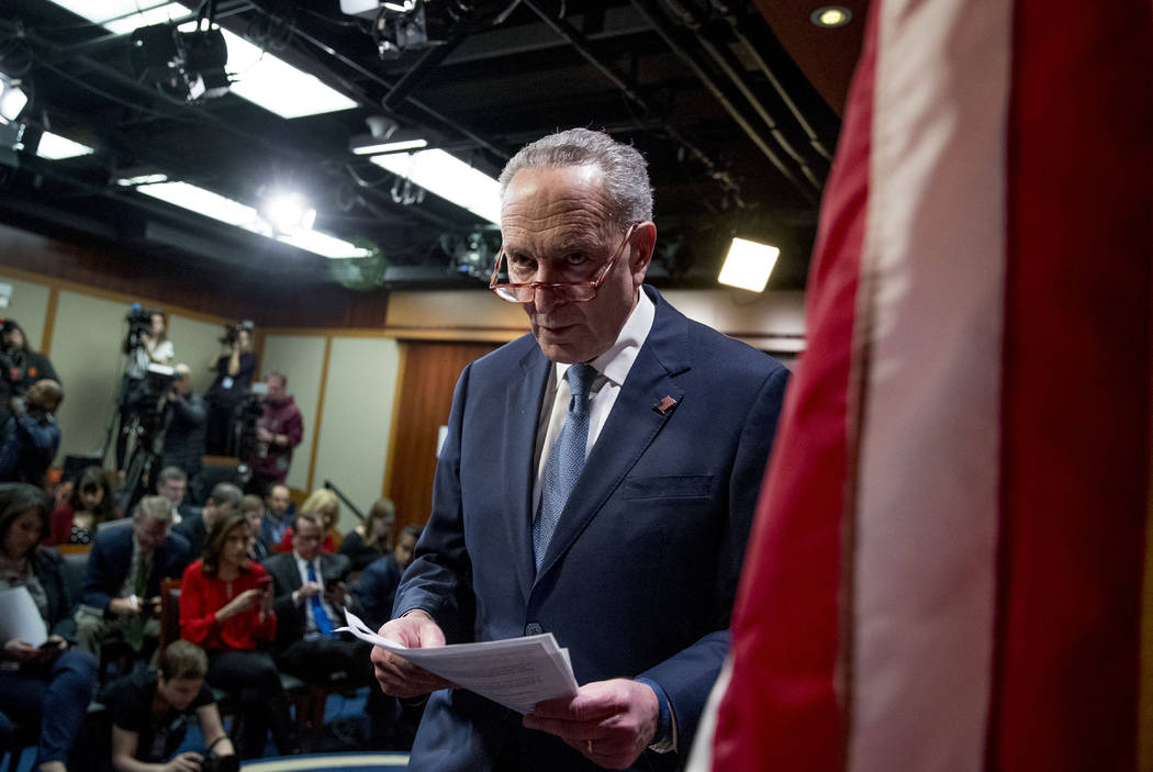 Senate Minority Leader Sen. Chuck Schumer of N.Y. leaves after speaking at a news conference, M ...