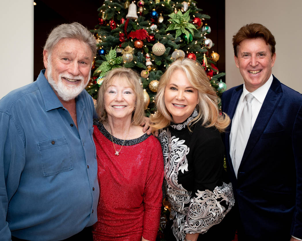 Rich and Claire McDonald, Kristen Routh-Silberman and Richard Luke at holiday party to collect ...