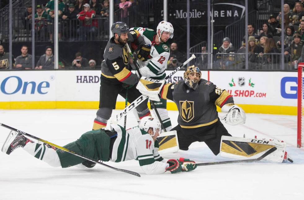 Vegas Golden Knights goaltender Marc-Andre Fleury (29) makes a save against Minnesota Wild left ...