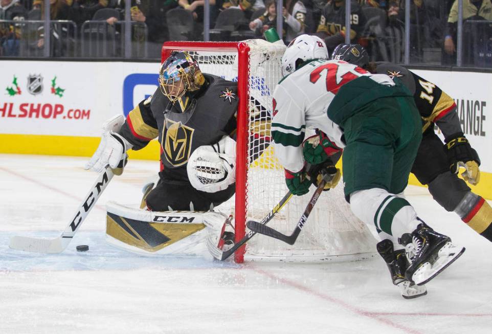 Vegas Golden Knights goaltender Marc-Andre Fleury (29) makes a save against Minnesota Wild left ...