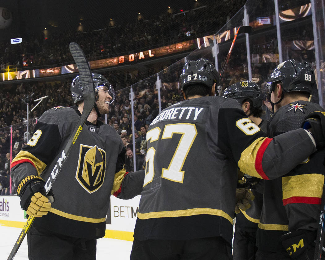 Vegas Golden Knights defenseman Brayden McNabb (3) celebrates with Vegas Golden Knights left wi ...