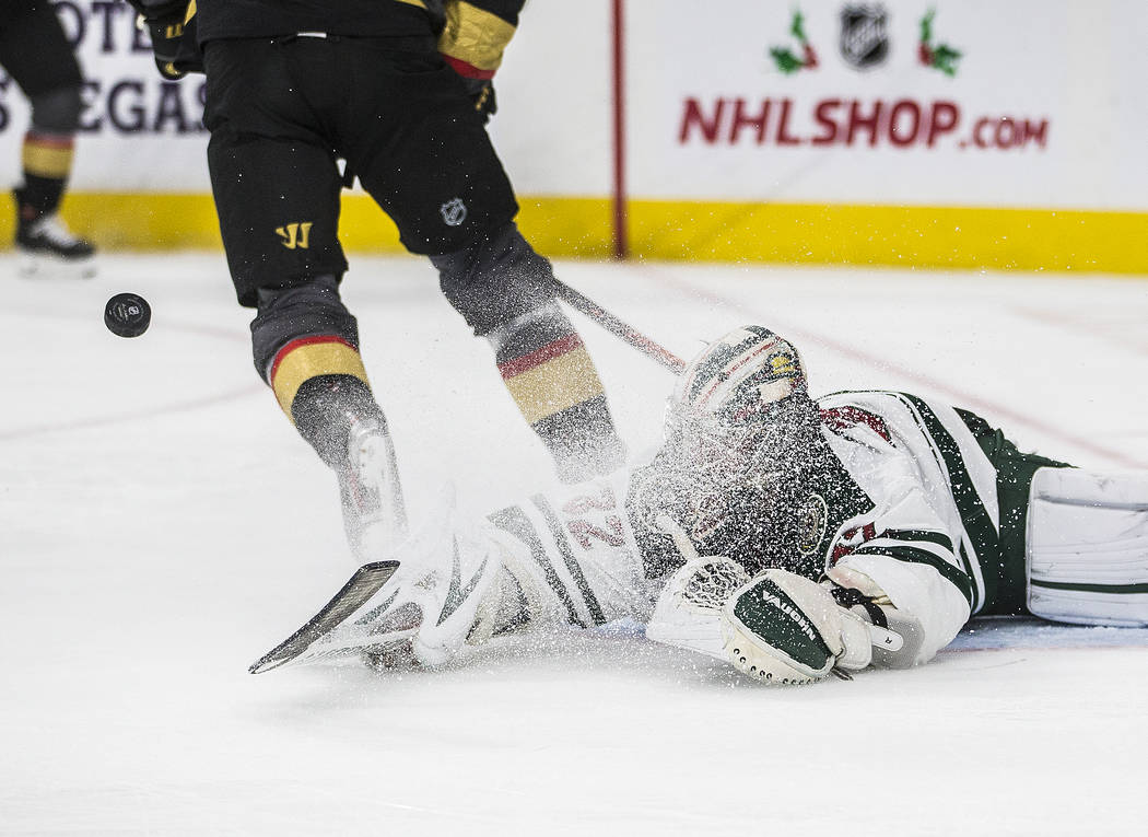 Minnesota Wild goaltender Alex Stalock (32) makes a diving save in the second period of an NHL ...