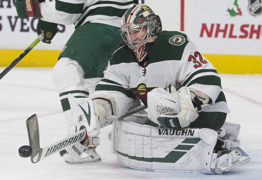 Minnesota Wild goaltender Alex Stalock (32) makes a stick save in the second period of an NHL h ...