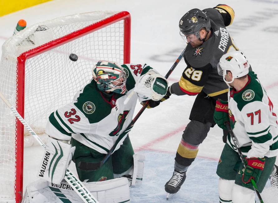 Vegas Golden Knights left wing William Carrier (28) assist's on a goal against Minnesota Wild g ...