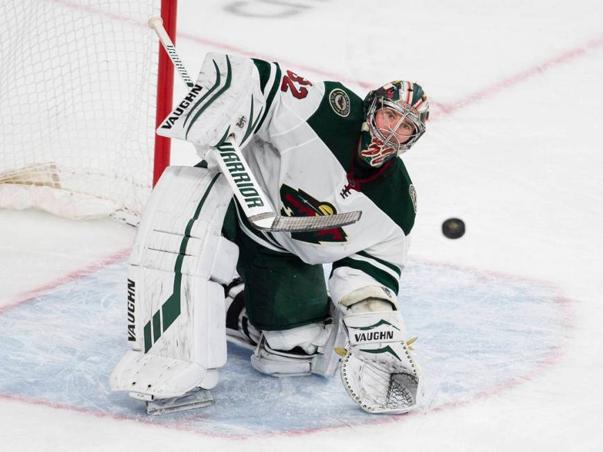 Minnesota Wild goaltender Alex Stalock (32) makes a save in the third period of an NHL hockey g ...