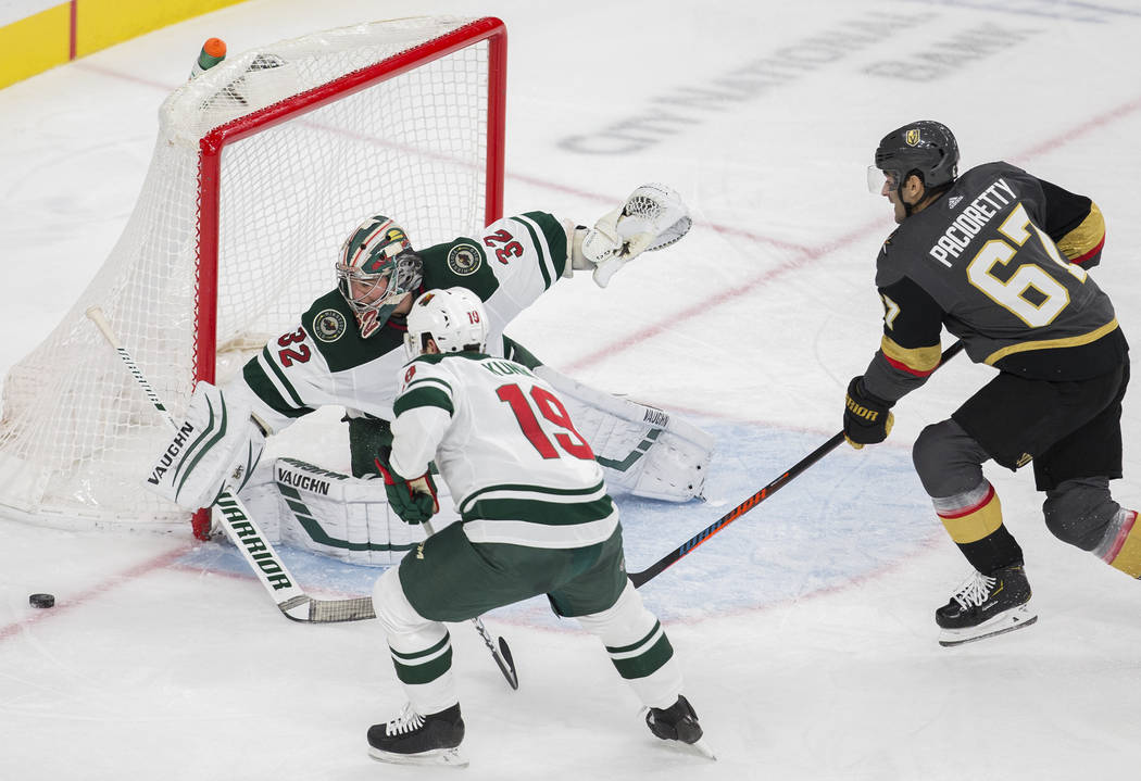 Minnesota Wild goaltender Alex Stalock (32) makes a save against Vegas Golden Knights left wing ...