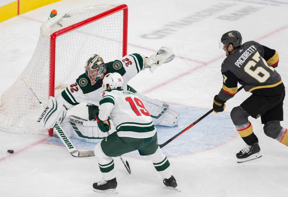 Minnesota Wild goaltender Alex Stalock (32) makes a save against Vegas Golden Knights left wing ...