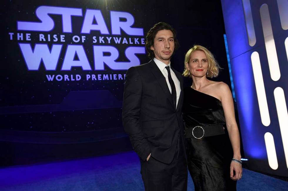 Adam Driver, left, and Joanne Tucker arrive at the world premiere of "Star Wars: The Rise ...