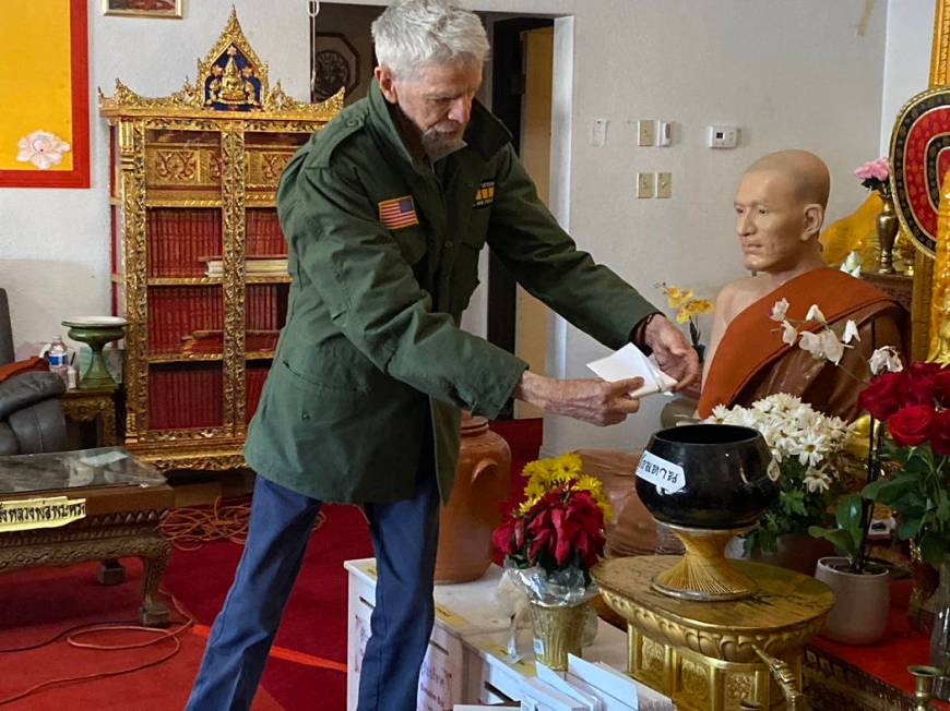 Vietnam veteran James Smales stops by the Thai Buddhist Temple of Las Vegas in North Las Vegas, ...