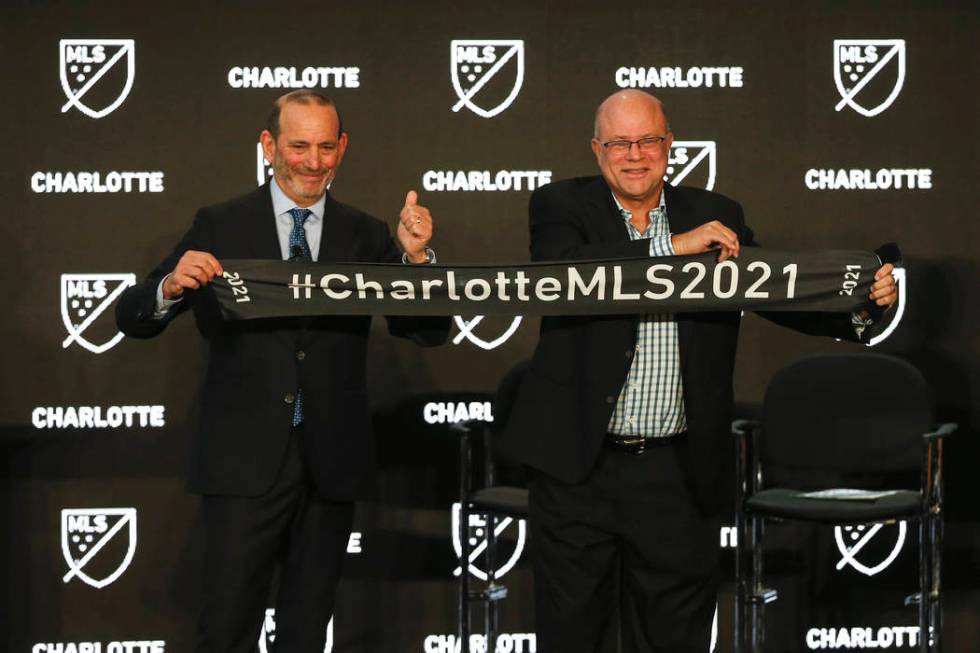 Major League Soccer Commissioner Don Garber, left, and Charlotte MLS team owner David Tepper an ...
