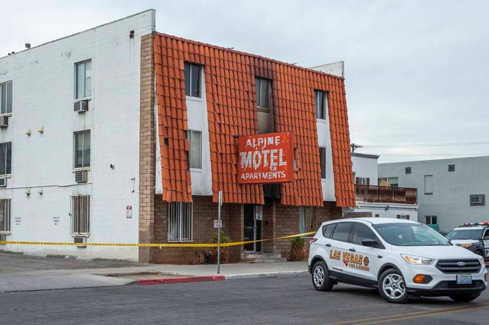 A Las Vegas Fire & Rescue vehicle arrives in the street outside of the Alpine Apartment Mot ...