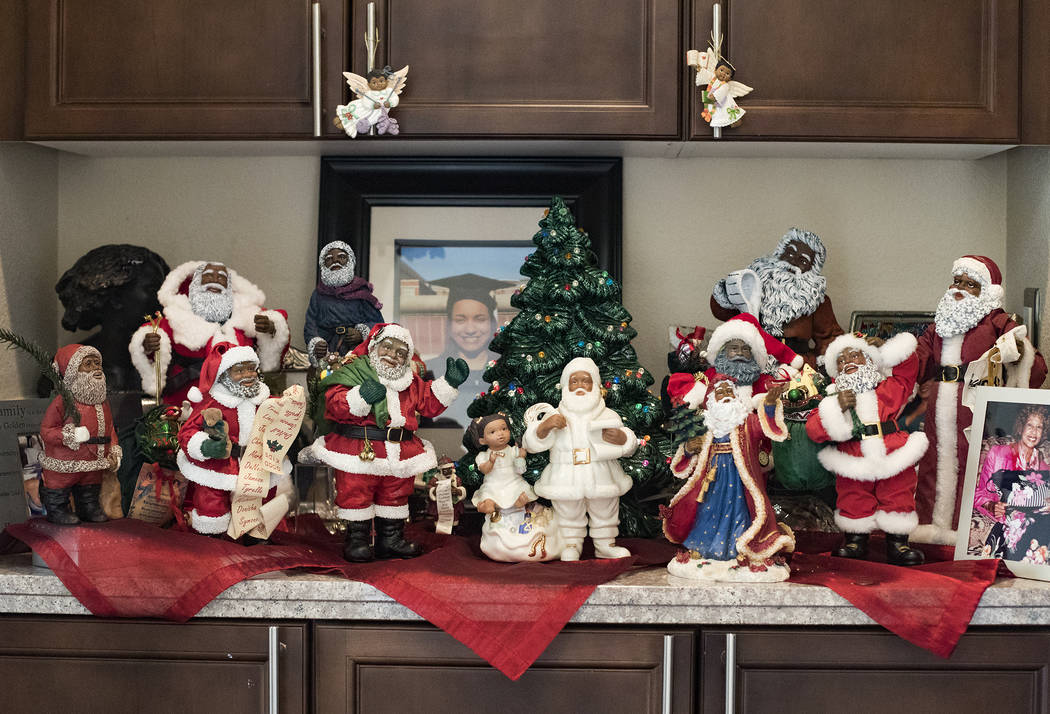 Santa Claus figurines at the home of Roxanne Givens in Las Vegas, Wednesday, Dec. 18, 2019. Giv ...