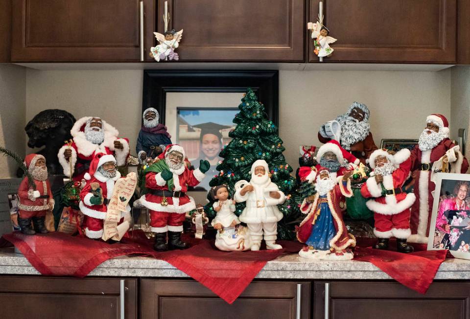 Santa Claus figurines at the home of Roxanne Givens in Las Vegas, Wednesday, Dec. 18, 2019. Giv ...