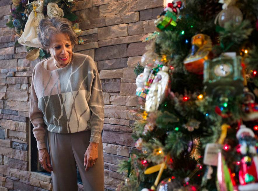 Roxanne Givens looks over her Christmas tree at her home in Las Vegas, Wednesday, Dec. 18, 2019 ...