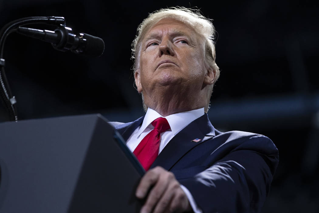 President Donald Trump speaks during a campaign rally at Kellogg Arena, Wednesday, Dec. 18, 201 ...