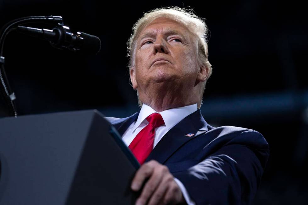 President Donald Trump speaks during a campaign rally at Kellogg Arena, Wednesday, Dec. 18, 201 ...