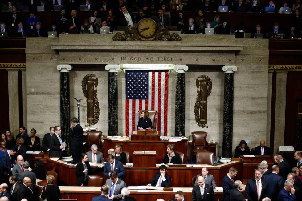 House Speaker Nancy Pelosi of Calif., speaks during a vote on the articles of impeachment again ...