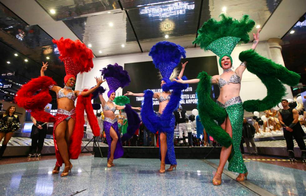 Showgirls, from left, Lauren Clark, Brooke Brown, Tara Noseck, and Jennifer Vossmer perform dur ...