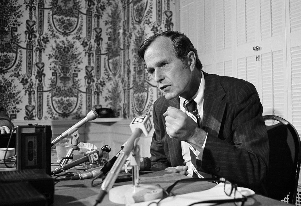 George Bush, Republician National Committee Chairman, tells a news conference on July 25, 1974 ...