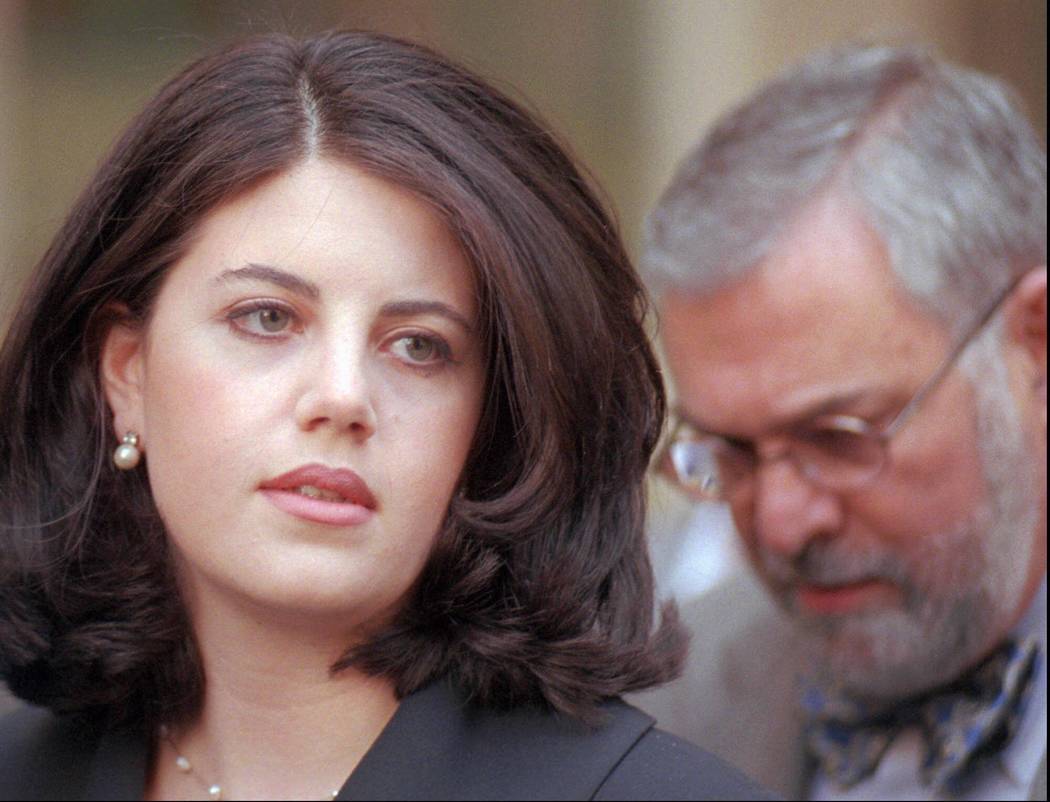 Former White House intern Monica Lewinsky and her attorney William Ginsburg are shown in Philad ...