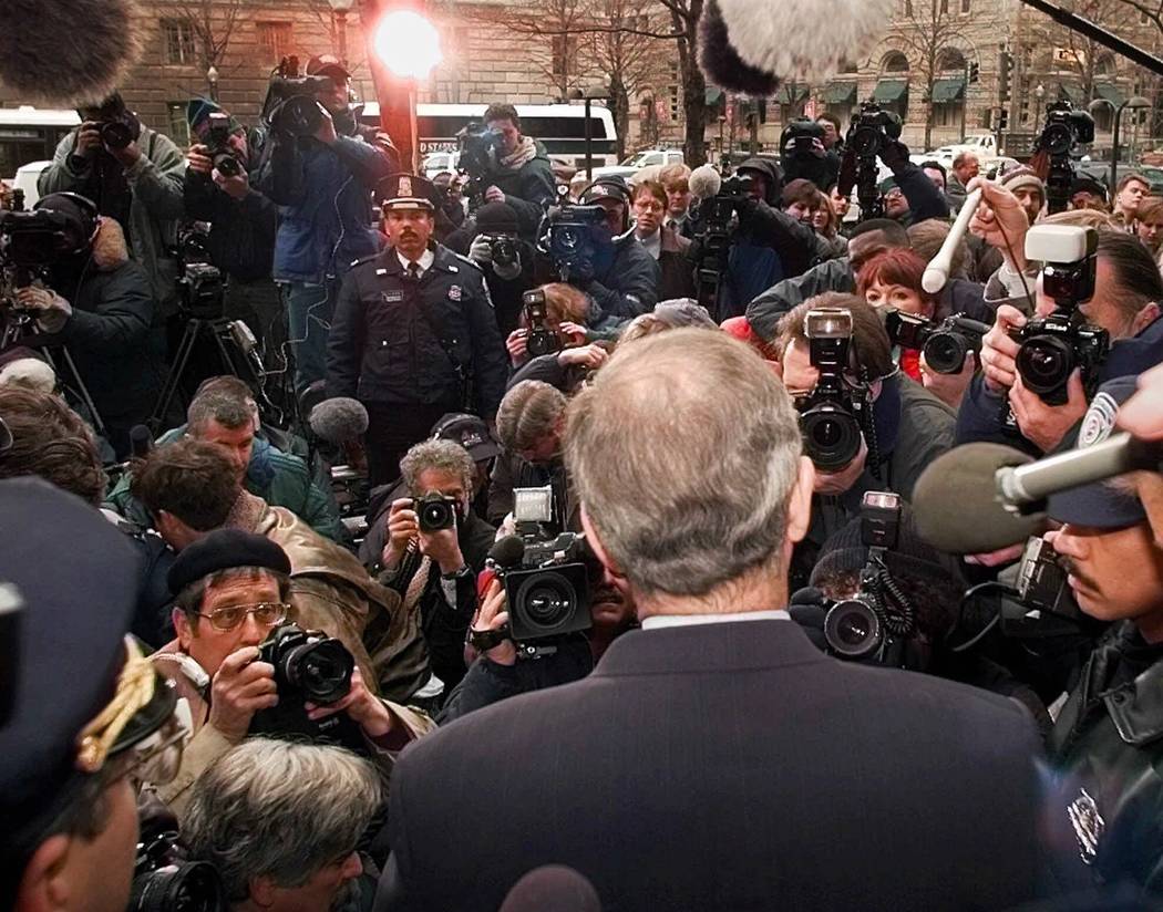 Whitewater prosecutor Kenneth Starr faces reporters and photographers Thursday, Jan. 22, 1998, ...