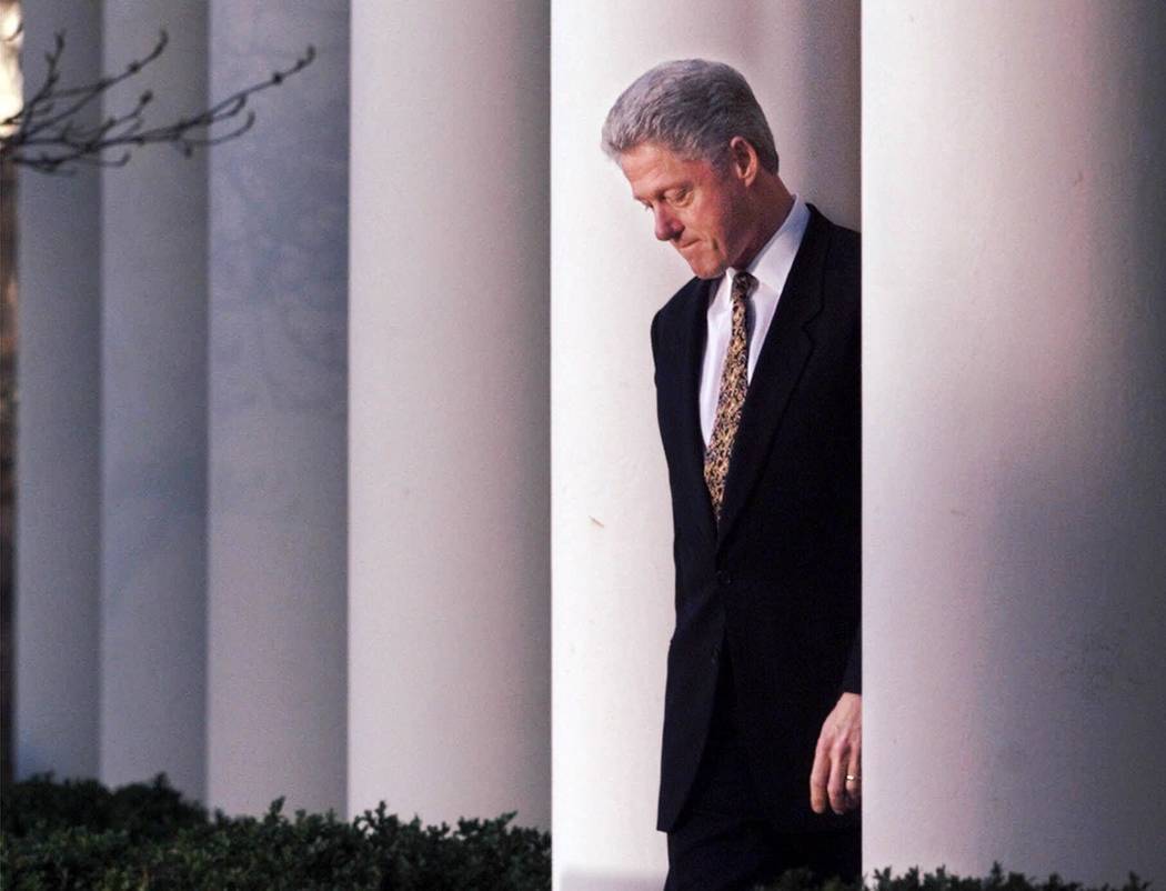 President Clinton approaches the podium to make statement on the impeachment inquiry at the Whi ...