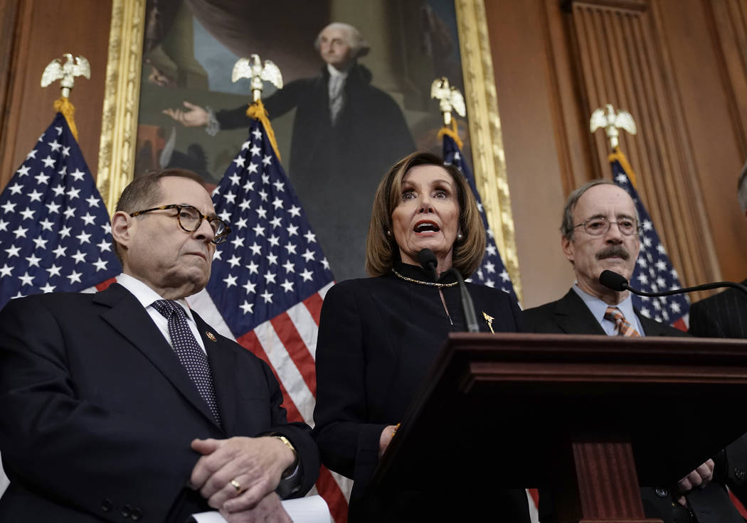 Speaker of the House Nancy Pelosi, D-Calif., flanked by House Judiciary Committee Chairman Jerr ...