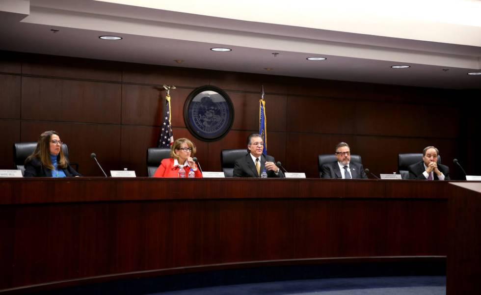 Nevada Gaming Commission members, from left, Rosa Solis-Rainey, Deborah Fuetsch, Chairman Tony ...