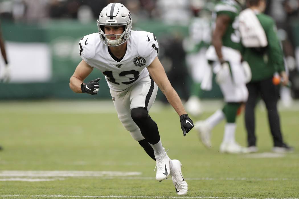 Oakland Raiders wide receiver Hunter Renfrow (13) warms up before an NFL football game against ...