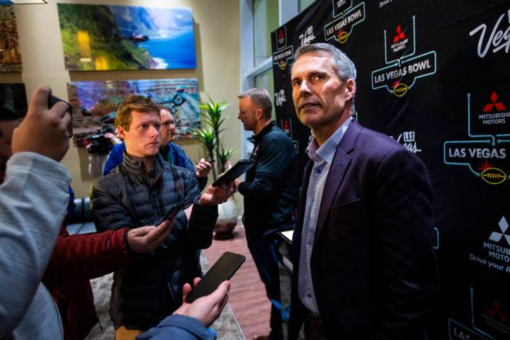 Washington head coach Chris Petersen speaks with reporters ahead of the Las Vegas Bowl NCAA col ...