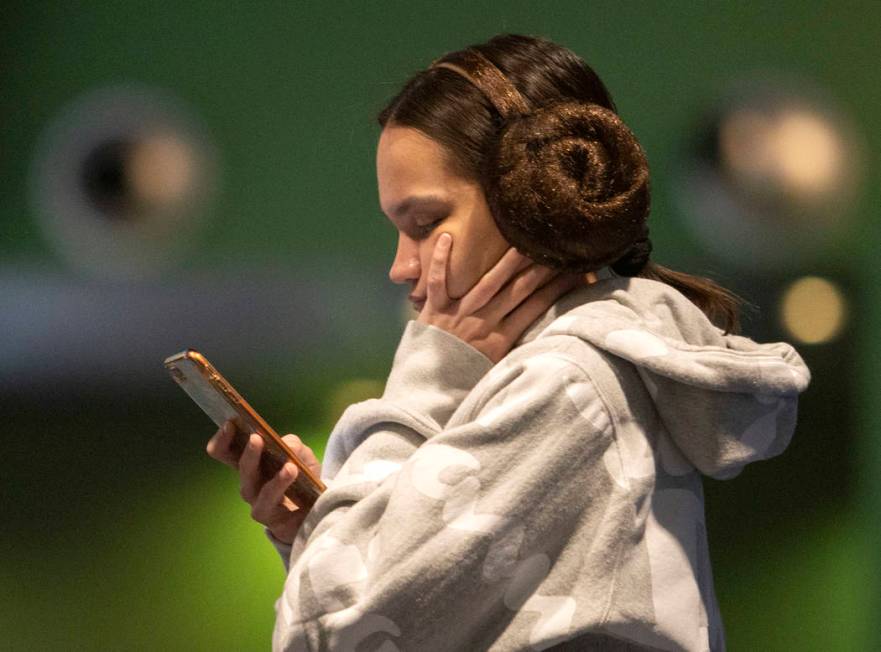 Sydney Pollard of Las Vegas wears a Princess Leia headband at the Star Wars: The Rise of Skywal ...