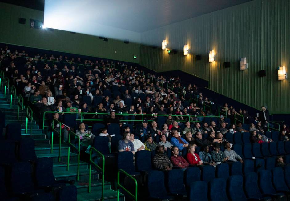 Star Wars fans watch previews before the Star Wars: The Rise of Skywalker premiere at AMC Town ...